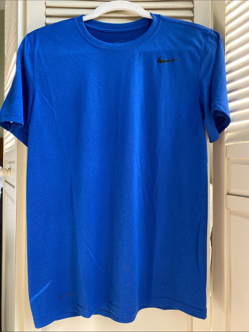 Nike Short Sleeve Athletic Tee in Royal Blue with Black Swoosh size S